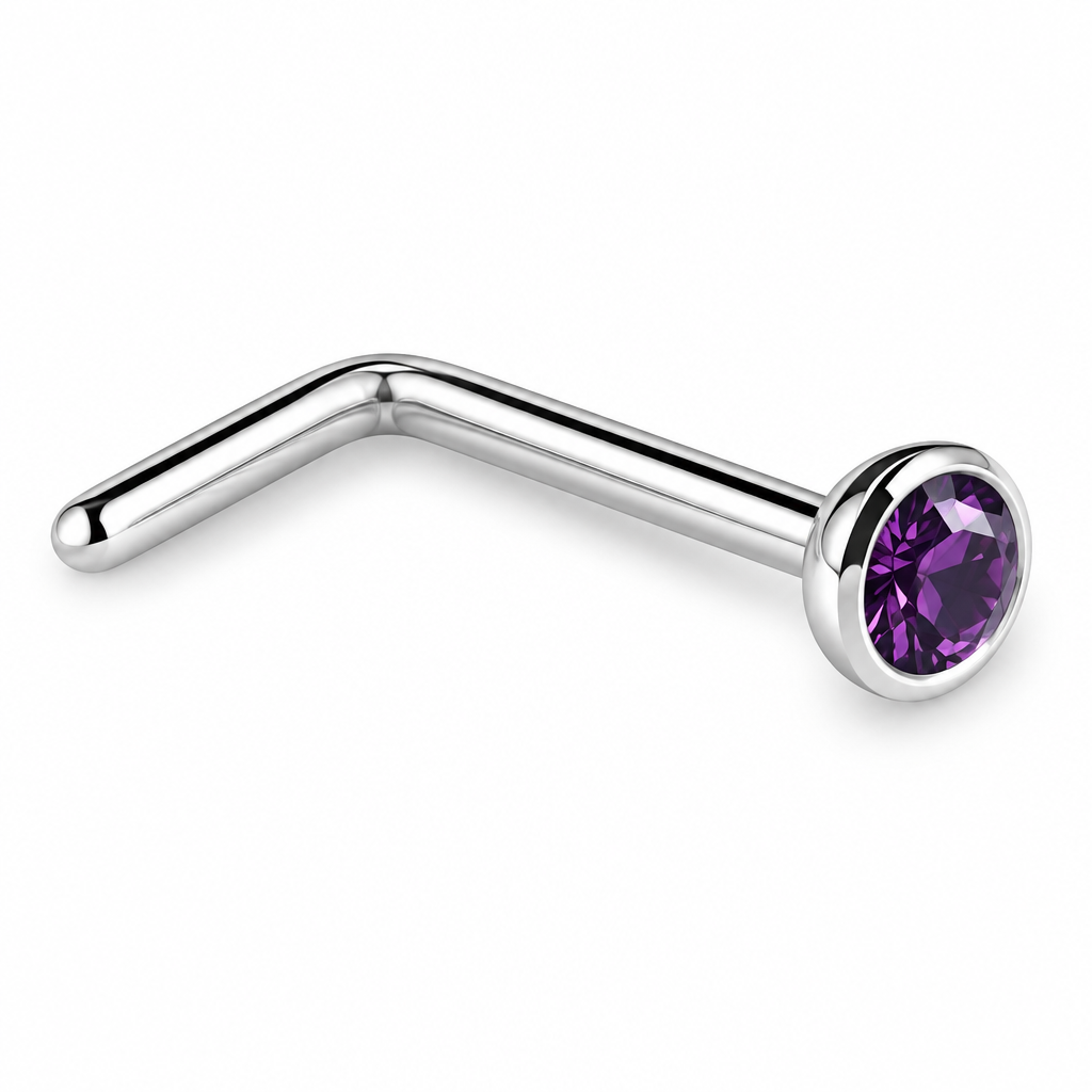 A curved silver-tone metal labret piercing stud with a faceted dark purple gemstone in a bezel setting, shown on a plain white background.