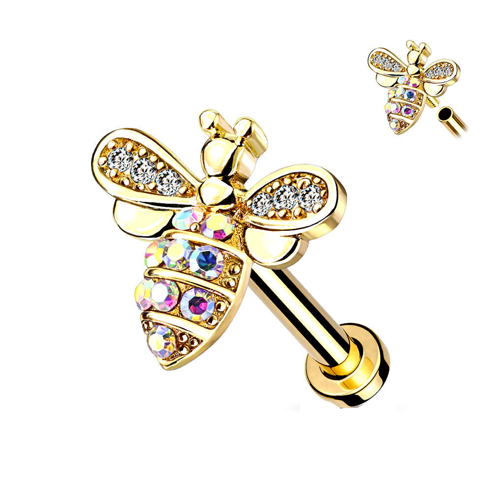 A gold-colored bee-shaped labret bar piercing jewelry with embedded stones.