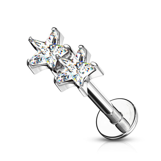 Star-shaped crystal belly button ring on a white background
