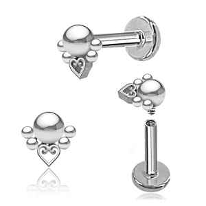 Silver tongue barbell with heart design on a white background
