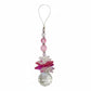 Decorative phone charm with pink butterfly and crystal on a white background