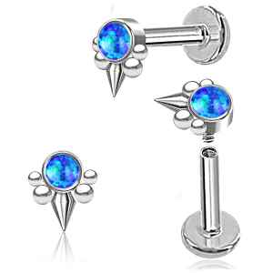 Pair of silver earrings with blue gemstones on a white background