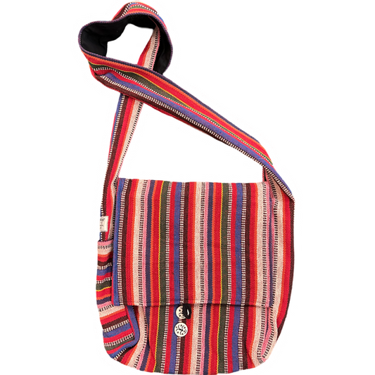 A multicolored striped shoulder bag with a zipper and a flat handle.