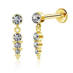 Gold earring with clear gemstones on a white background