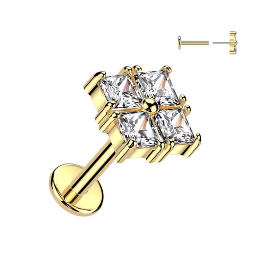 Gold earring with a large diamond on a white background