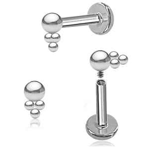 Pair of silver lip or nose rings with spherical ends on a white background