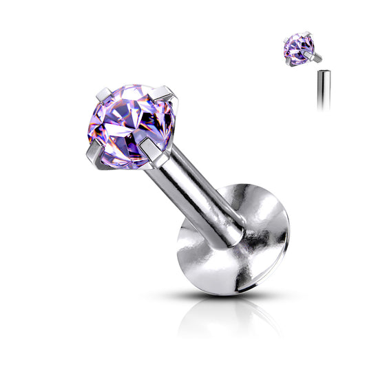 Silver lip ring with a purple gemstone on a white background