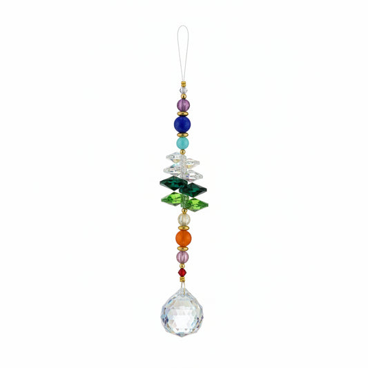 A beaded glass ornament labeled '$14 Rainbow Hope' hanging from a gold string, resting on a scratched brown wooden surface. The ornament features a large iridescent teardrop bead at the bottom, surrounded by various colorful glass beads in blue, green, orange, and clear.