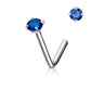 A silver-toned curved barbell stud earring with a round-cut blue gemstone, shown on a clean white background with a smaller inset view of the gemstone at the top right.