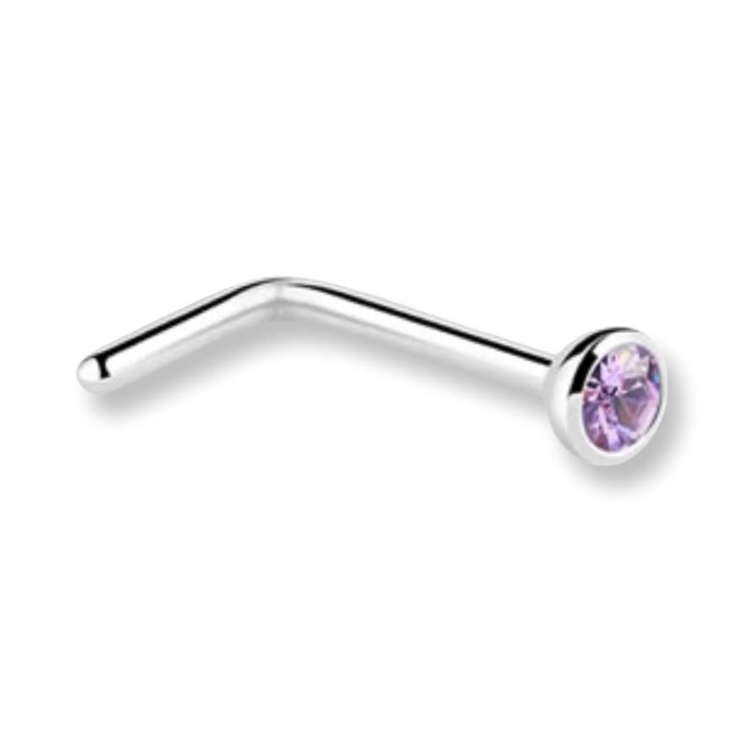A silver-toned curved barbell nose stud with a round bezel-set light purple gemstone, shown on a plain white background.